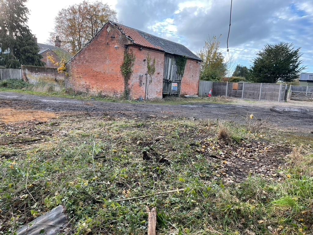 The Grain Barn — original brick barn before conversion, Norfolk